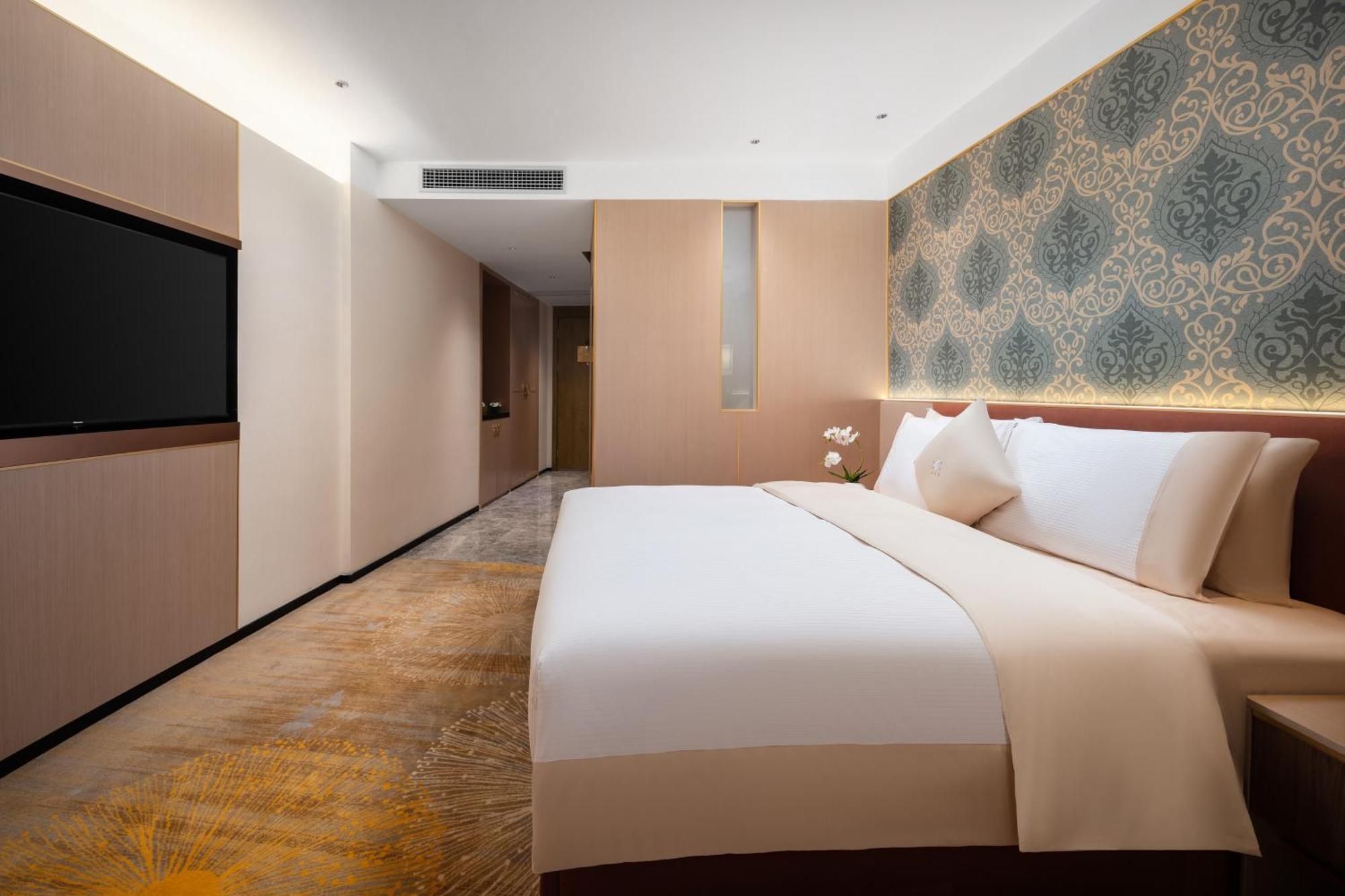 Guangzhou Wogo Yuanbao Hotel-Zhujiang New Town-Free Canton Fair Shuttle Bus & Overseas Buyer Registration Services Exterior photo